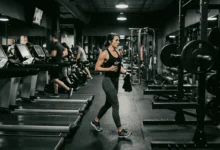 "Does cardio kill gains — gym photo showing transition from treadmill cardio session to barbell squat rack for resistance training"
